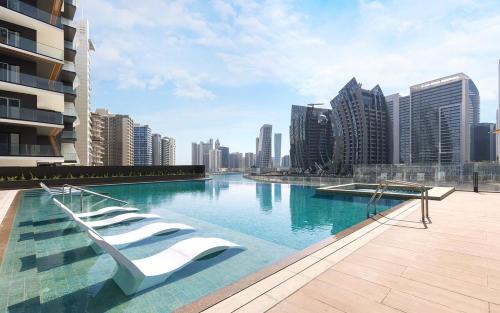 Tick- Lavish Studio with Canal & Burj Khalifa View in Madinat Zayid Tick- Lavish Studio with Canal & Burj Khalifa View in Madinat Zayid
