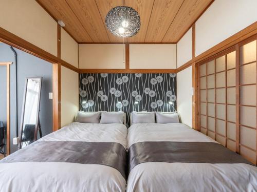 Family-Friendly Villa with BBQ, Baby Gear, Free Parking, 8min to Subway in 百道 Family-Friendly Villa with BBQ, Baby Gear, Free Parking, 8min to Subway in 百道