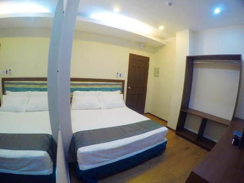 โกลเดน เกต สวีท (Golden Gate Suites) in ดูมาเกเต โกลเดน เกต สวีท (Golden Gate Suites) in ดูมาเกเต