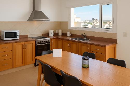 Linea Recta Sur- Aguila Mora, departamento amplio de 3 dormitorios a pasos del mar in بويرتو مادرين Linea Recta Sur- Aguila Mora, departamento amplio de 3 dormitorios a pasos del mar in بويرتو مادرين