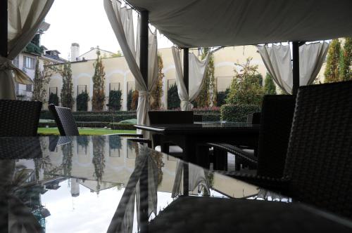 Garden, Grand Visconti Palace Hotel in Porta Romana Garden, Grand Visconti Palace Hotel in Porta Romana