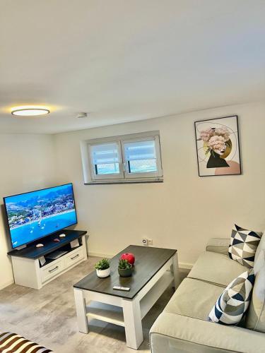 Közös társalgó / TV, Zwei Zimmer Wohnung Nah Flughafen Messe in Filderstadt Közös társalgó / TV, Zwei Zimmer Wohnung Nah Flughafen Messe in Filderstadt