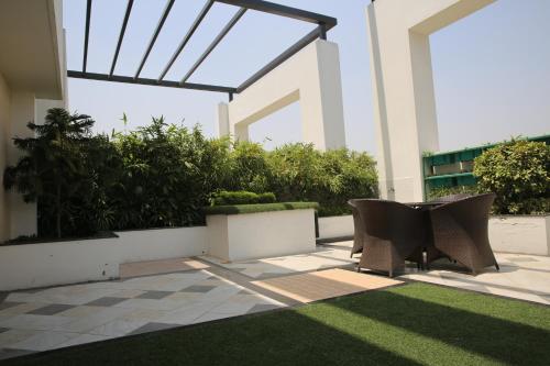 Balcony/terrace, Ramada by Wyndham Ghaziabad Vasundhara in Ghaziabad Balcony/terrace, Ramada by Wyndham Ghaziabad Vasundhara in Ghaziabad