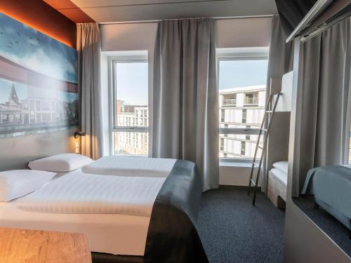 Guestroom, B&B HOTEL Aalborg in Aalborg City Center Guestroom, B&B HOTEL Aalborg in Aalborg City Center