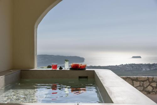 Pezsgőfürdő, Zatrikion Santorini Villas in Moni Profitou Iliou Pezsgőfürdő, Zatrikion Santorini Villas in Moni Profitou Iliou