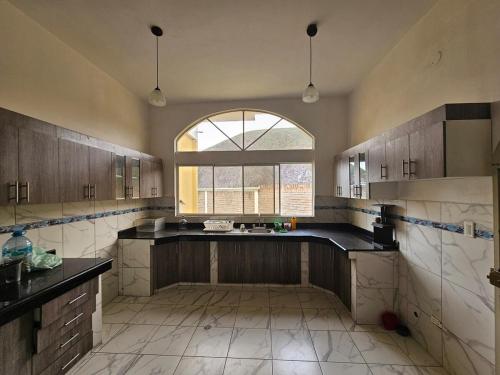 ห้องครัว, House - Quinta Paraíso Mitad del Mundo (House - Quinta Paraiso Mitad del Mundo) in ซานอันโตนิโอเดอพิชินชา ห้องครัว, House - Quinta Paraíso Mitad del Mundo (House - Quinta Paraiso Mitad del Mundo) in ซานอันโตนิโอเดอพิชินชา