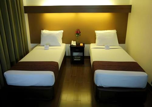 The Ritz Hotel at Garden Oases (Multiple-Use Hotel)