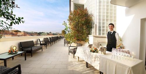 Erkély/terasz, Hotel Airone - Ombrellone incluso al bagno Dolce Vita a Marina dal 1 giugno al 15 settembre in Grosseto Erkély/terasz, Hotel Airone - Ombrellone incluso al bagno Dolce Vita a Marina dal 1 giugno al 15 settembre in Grosseto