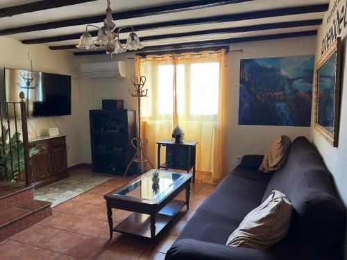 Közös társalgó / TV, Casa Rivendel - Fantasía, Confort y Naturaleza (Casa Rivendel - Fantasia, Confort y Naturaleza) in Poyales Del Hoyo Közös társalgó / TV, Casa Rivendel - Fantasía, Confort y Naturaleza (Casa Rivendel - Fantasia, Confort y Naturaleza) in Poyales Del Hoyo