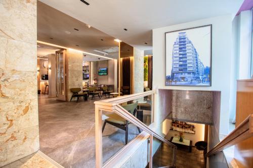 共用Lounge/電視區, 格蘭維亞酒店 (Hotel Gran Via) in 薩拉戈薩近中心 共用Lounge/電視區, 格蘭維亞酒店 (Hotel Gran Via) in 薩拉戈薩近中心