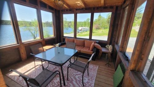 Uitzicht, Grand Spruce Lodge in Kenora (Ontario) Uitzicht, Grand Spruce Lodge in Kenora (Ontario)