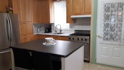 Kitchen, auberge gite maison des lilas in La Malbaie (QC) Kitchen, auberge gite maison des lilas in La Malbaie (QC)