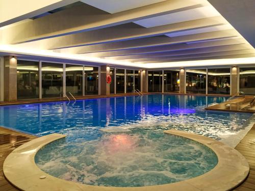 Zwembad, Hotel Covilha Doña Maria Affiliated by Meliá in Covilha Zwembad, Hotel Covilha Doña Maria Affiliated by Meliá in Covilha