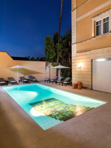 Swimming pool, UNA HOTELS One Catania in Canolicchio Swimming pool, UNA HOTELS One Catania in Canolicchio