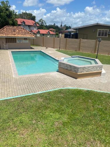 مسبح, Palm Springs Apartments in Couva مسبح, Palm Springs Apartments in Couva