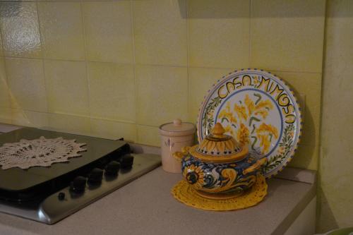 Cocina, Casa Mimosa - Appartamento con giardino a 50 mt dal mare in Furnari Cocina, Casa Mimosa - Appartamento con giardino a 50 mt dal mare in Furnari