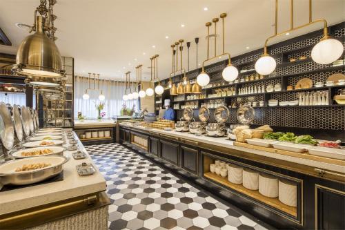 Étterem, Yiwu The Pury Hotel near Jiangdong utca Étterem, Yiwu The Pury Hotel near Jiangdong utca