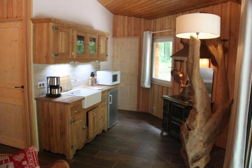 Kitchen, L'isba des bois, hors du temps in Janvry Kitchen, L'isba des bois, hors du temps in Janvry
