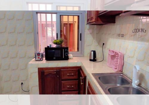 Kitchen, Residence Douce in Dakar Kitchen, Residence Douce in Dakar