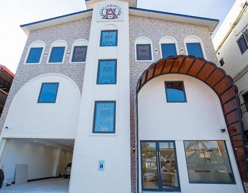 Buitenkant, Hotel Americano in Saipan Buitenkant, Hotel Americano in Saipan