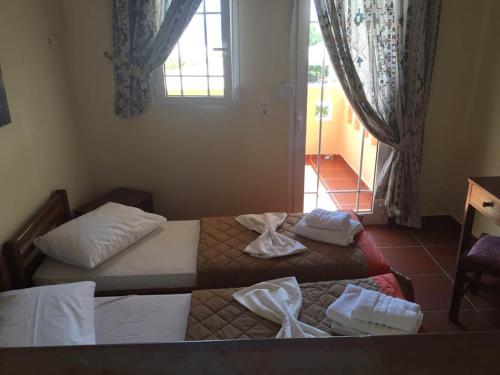 Toulipa Rooms in อาเยีย เออร์มิโฮนี Toulipa Rooms in อาเยีย เออร์มิโฮนี