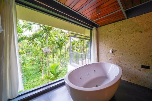 حمام, منزل 4000 متر مربع من 1 غرفة و1 حمام خاص في Aladagudde (Open Hotel by Olive - Biranji Aqua Retreat) in Aladagudde حمام, منزل 4000 متر مربع من 1 غرفة و1 حمام خاص في Aladagudde (Open Hotel by Olive - Biranji Aqua Retreat) in Aladagudde