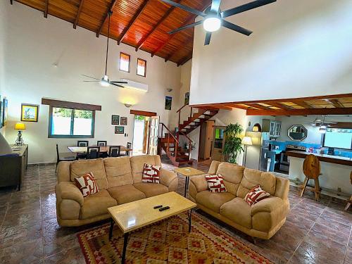 Shared lounge/TV area, Intimate Earthy Vibe - Bedroom in a Tropical Paradise in Herradura Shared lounge/TV area, Intimate Earthy Vibe - Bedroom in a Tropical Paradise in Herradura