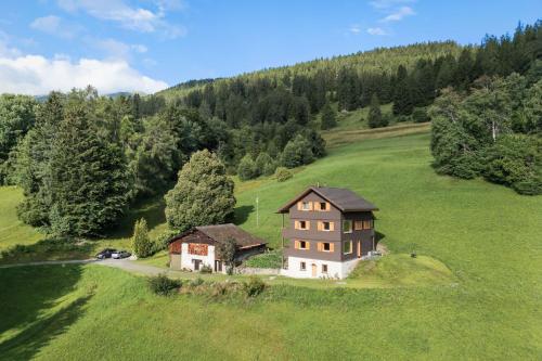 A szálláshely kívülről, Ruheoase mit Bergsicht in Malix A szálláshely kívülről, Ruheoase mit Bergsicht in Malix
