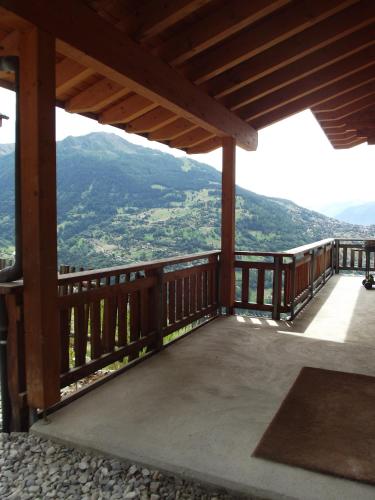 Balcony/terrace, Tschoueilles 013 MOUNTAIN & VIEW - chalet 12 pers in Clebes Balcony/terrace, Tschoueilles 013 MOUNTAIN & VIEW - chalet 12 pers in Clebes