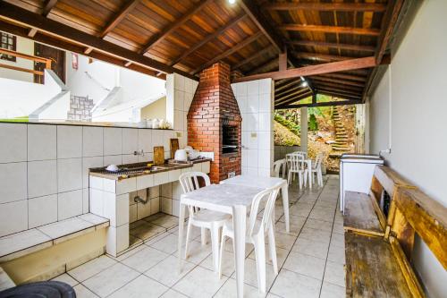 مطبخ, VELINN Pousada Mirante da Praia Grande in Praia Grande مطبخ, VELINN Pousada Mirante da Praia Grande in Praia Grande