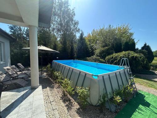 Úszómedence, Villa Otolice obok Łowicza, 6 sypialni, basen, sauna, snooker, 50 minut od Warszawy i Łodzi (Villa Otolice obok Lowicza, 6 sypialni, basen, sauna, snooker, 50 minut od Warszawy i Lodzi) in Lowicz Úszómedence, Villa Otolice obok Łowicza, 6 sypialni, basen, sauna, snooker, 50 minut od Warszawy i Łodzi (Villa Otolice obok Lowicza, 6 sypialni, basen, sauna, snooker, 50 minut od Warszawy i Lodzi) in Lowicz