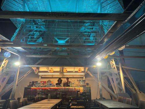 Vista exterior, Capsule Hostel Beppu Tower in Beppu Vista exterior, Capsule Hostel Beppu Tower in Beppu