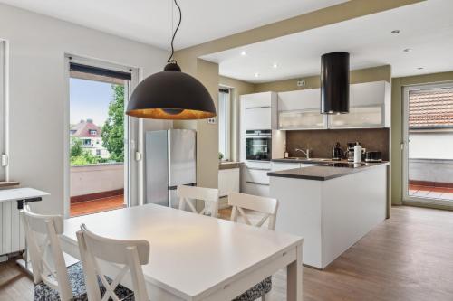 Küche, cruwzo- Moderne & gemütliche Apartments (cruwzo- Moderne & gemutliche Apartments) in Cottbus Küche, cruwzo- Moderne & gemütliche Apartments (cruwzo- Moderne & gemutliche Apartments) in Cottbus