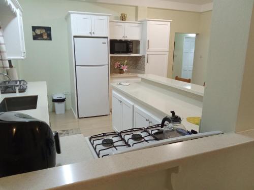 J & L Golf Course Apartments in Belmont J & L Golf Course Apartments in Belmont