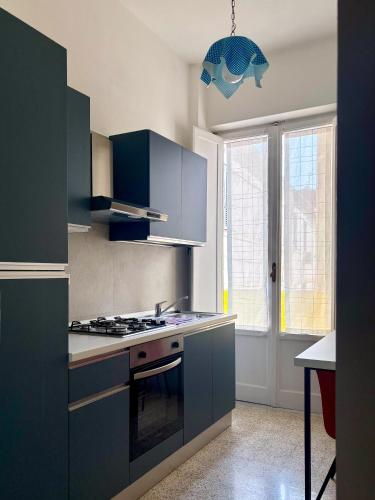 Kitchen, Old Lady - Apartment in Reggio Calabria Kitchen, Old Lady - Apartment in Reggio Calabria