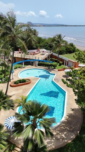 Cozy and Relaxing Oceanfront Apartment in 투카카스 Cozy and Relaxing Oceanfront Apartment in 투카카스