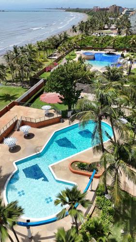 Cozy and Relaxing Oceanfront Apartment in 투카카스 Cozy and Relaxing Oceanfront Apartment in 투카카스