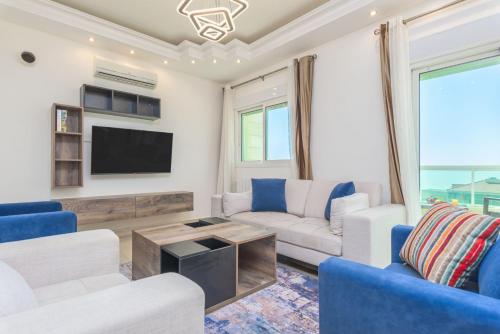 Közös társalgó / TV, Glint 3-Bedroom Apartment & Balcony in Aley in Aley Közös társalgó / TV, Glint 3-Bedroom Apartment & Balcony in Aley in Aley