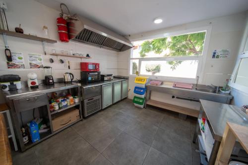 Kitchen, Be Happy Hostel - Albergue en el centro de Nerja in Nerja Kitchen, Be Happy Hostel - Albergue en el centro de Nerja in Nerja