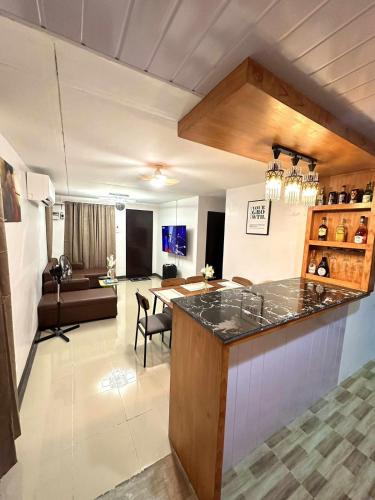 Shared lounge/TV area, House in Davao near Loleng's Mountain Spring Resort Shared lounge/TV area, House in Davao near Loleng's Mountain Spring Resort