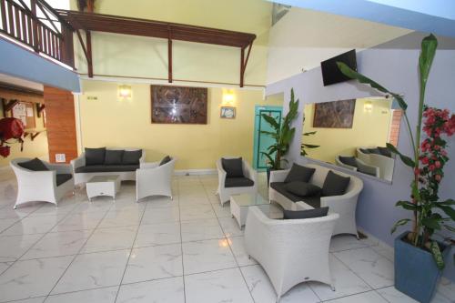 Shared lounge/TV area, Hotel La Maison Creole in Gosier Shared lounge/TV area, Hotel La Maison Creole in Gosier