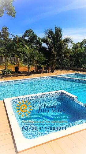Swimming pool, Habitacion Triple Equipada, Posada Villa Mayo a 5 minutos de Playa Parguito in El Hato Swimming pool, Habitacion Triple Equipada, Posada Villa Mayo a 5 minutos de Playa Parguito in El Hato