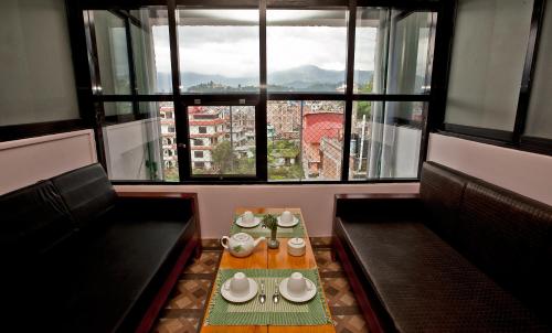 صالة مشتركة/ منطقة التلفزيون, بودها إن (Boudha Inn) in باودا جورباتي صالة مشتركة/ منطقة التلفزيون, بودها إن (Boudha Inn) in باودا جورباتي