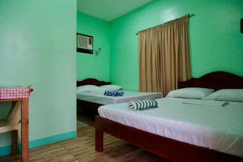 Sangi Tourist Inn near Kawasan Badian Canyoneering in Alegria Sangi Tourist Inn near Kawasan Badian Canyoneering in Alegria