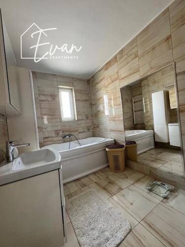 Fürdőszoba, Shopping City Apartment by Evan Apartments in Selimbar Fürdőszoba, Shopping City Apartment by Evan Apartments in Selimbar