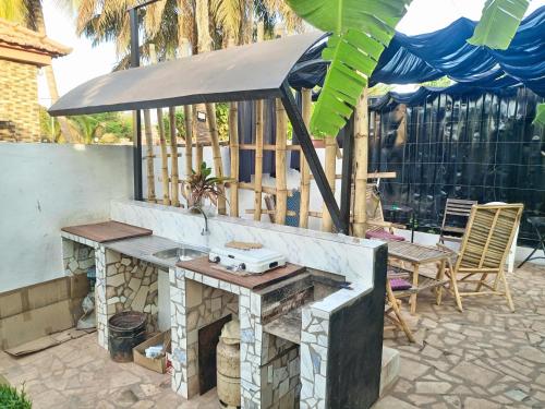 מטבח, Casa Cacheu Homestay Guest House in ביסאו מטבח, Casa Cacheu Homestay Guest House in ביסאו