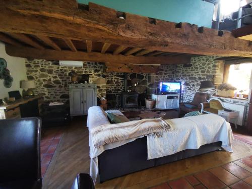 Közös társalgó / TV, Maison du Domaine des Garde Bousset in Pionsat Közös társalgó / TV, Maison du Domaine des Garde Bousset in Pionsat