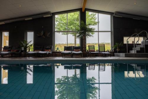 Úszómedence, Orums Nygard Gardshotell in Loderup Úszómedence, Orums Nygard Gardshotell in Loderup