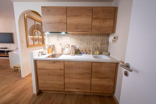 מטבח, Cocoon - Romantic suite with spa - Downtown in Pontarlier מטבח, Cocoon - Romantic suite with spa - Downtown in Pontarlier