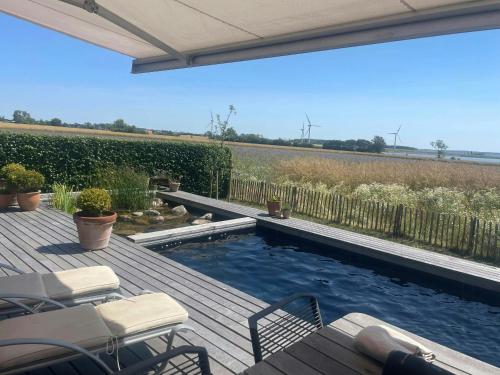 Exterior view, Holiday Home With Panoramic Views And Nature Pool in Harpelunde Exterior view, Holiday Home With Panoramic Views And Nature Pool in Harpelunde